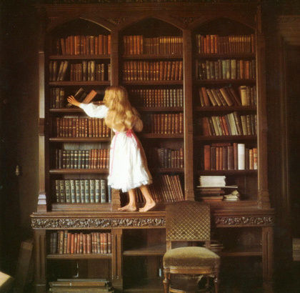 child reaching for book.jpg
